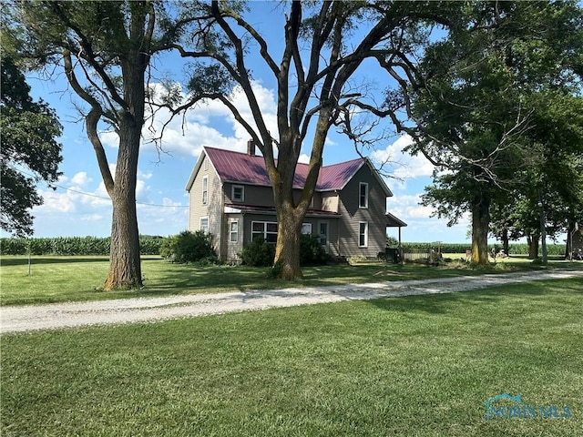 11080 Rd 21, Antwerp, OH 45813 - view of front of property featuring a front yard and a metal roof
