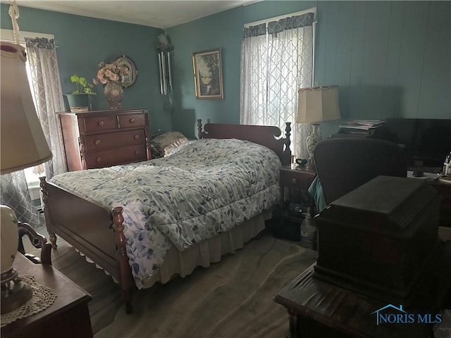 11080 Rd 21, Antwerp, OH 45813 - bedroom with multiple windows, wood finished floors, and a desk