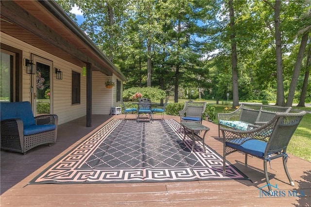 8411 Larch Rd, Toledo, OH 43617 - deck featuring view of wooded area