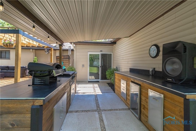 8411 Larch Rd, Toledo, OH 43617 - view of patio featuring an outdoor kitchen and wine cooler