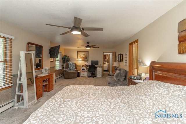 8411 Larch Rd, Toledo, OH 43617 - bedroom with carpet flooring, baseboard heating, an office area, and a baseboard radiator