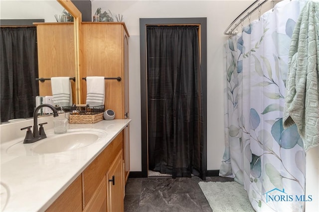 8411 Larch Rd, Toledo, OH 43617 - full bathroom with vanity and marble finish flooring