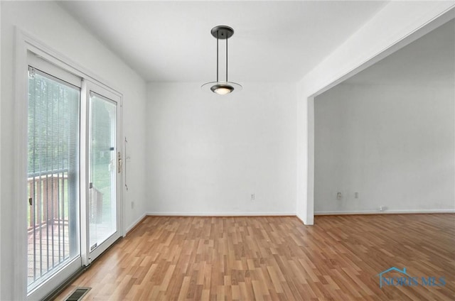 1939 Macomber St, Toledo, OH 43606 - unfurnished dining area with light wood-style flooring