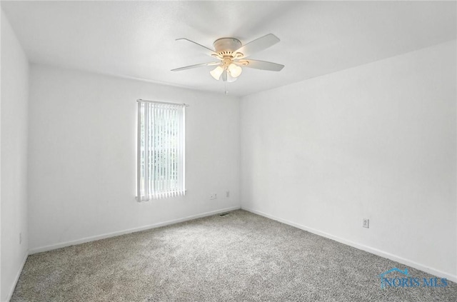 1939 Macomber St, Toledo, OH 43606 - carpeted empty room with a ceiling fan and baseboards