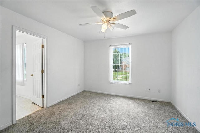 1939 Macomber St, Toledo, OH 43606 - unfurnished room featuring carpet flooring and ceiling fan