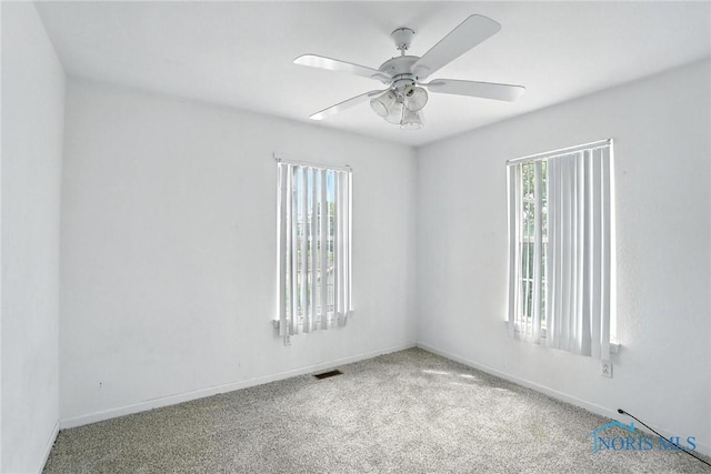 1939 Macomber St, Toledo, OH 43606 - carpeted empty room with a ceiling fan and baseboards