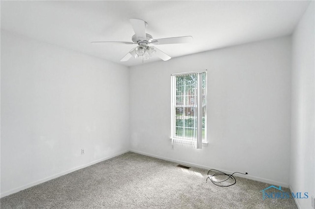 1939 Macomber St, Toledo, OH 43606 - carpeted empty room with a ceiling fan and baseboards