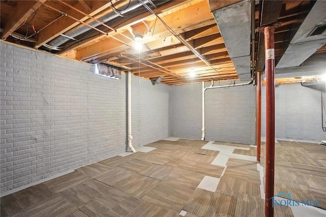 1939 Macomber St, Toledo, OH 43606 - unfinished below grade area featuring carpet