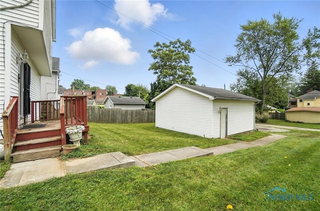 1939 Macomber St, Toledo, OH 43606 - view of yard with an outdoor structure and a deck