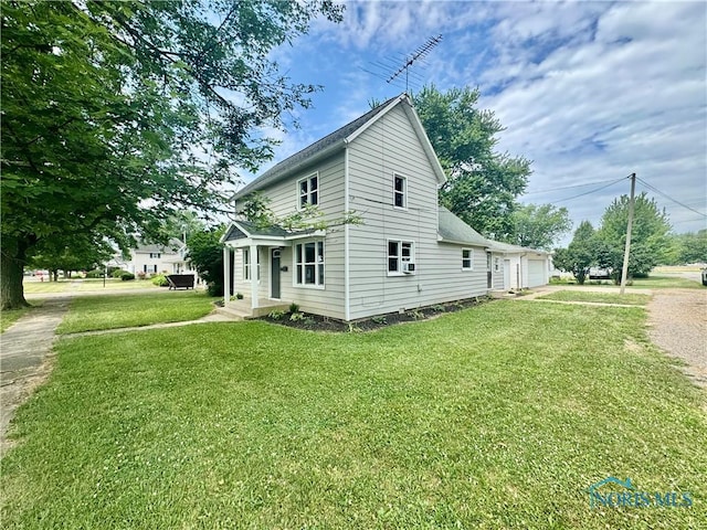 339 N E Ave, Deshler, OH 43516 - view of property exterior featuring a yard and driveway