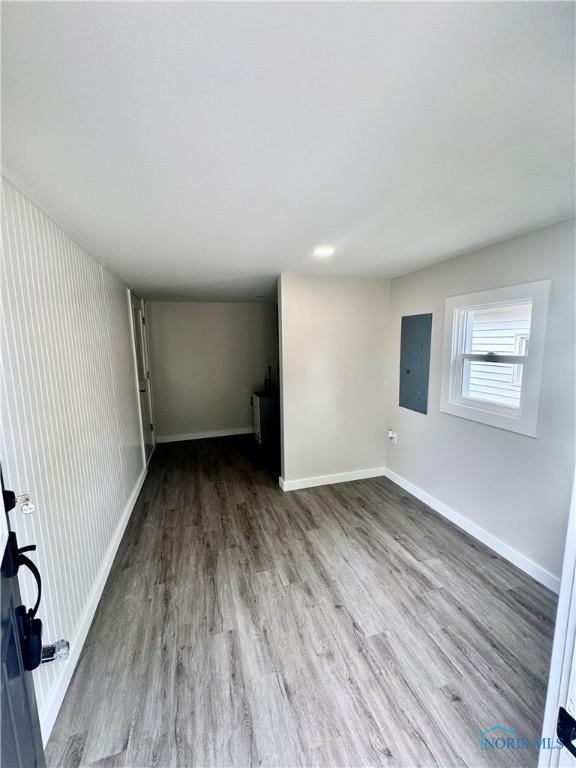 339 N E Ave, Deshler, OH 43516 - spare room with wood finished floors and electric panel