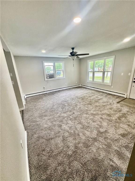 339 N E Ave, Deshler, OH 43516 - carpeted empty room featuring ceiling fan, baseboard heating, and recessed lighting