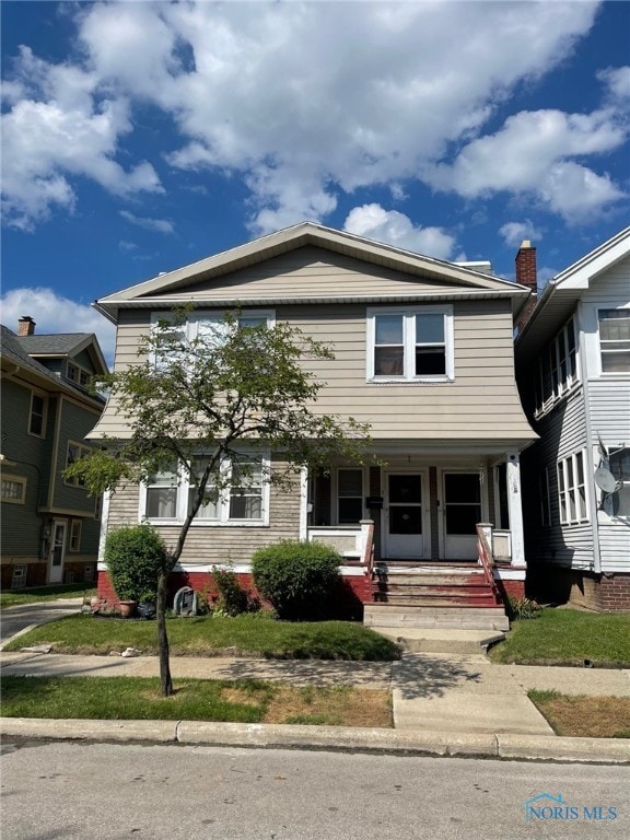 421 Oswald St, Toledo, OH 43605 - view of front of house featuring covered porch