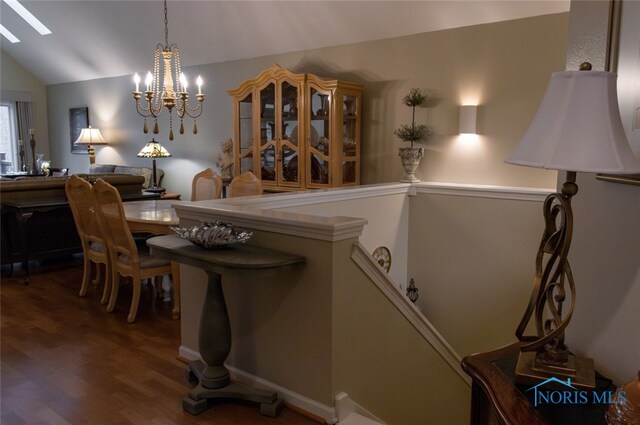 1533 Eaglebrook Rd Unit 1533, Toledo, OH 43615 - dining room with vaulted ceiling, a chandelier, and wood finished floors