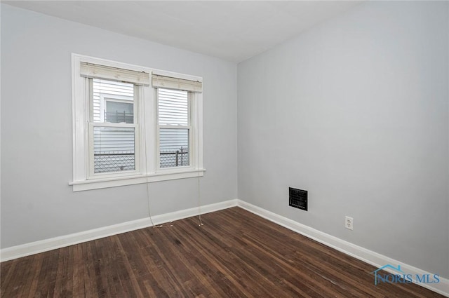 2517 Montebello Rd, Toledo, OH 43607 - unfurnished room with dark wood-style floors and baseboards
