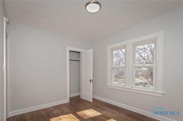 2517 Montebello Rd, Toledo, OH 43607 - unfurnished bedroom featuring wood finished floors and a closet