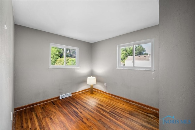 5201 Arbor Way, Sylvania, OH 43560 - empty room with baseboards and wood-type flooring