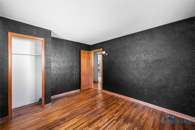 5201 Arbor Way, Sylvania, OH 43560 - unfurnished bedroom featuring wood finished floors and a closet