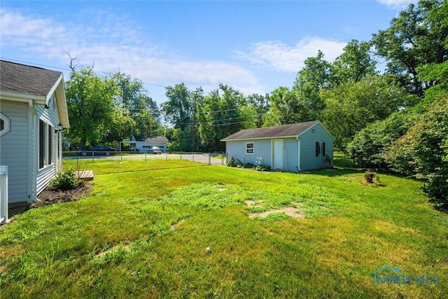 5201 Arbor Way, Sylvania, OH 43560 - view of yard featuring an outdoor structure and view of wooded area