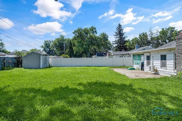 3253 Radford Dr, Toledo, OH 43614 - fenced backyard featuring a patio and a storage shed