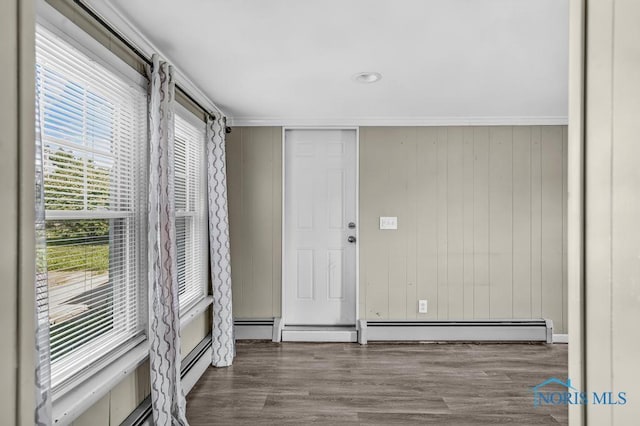 3253 Radford Dr, Toledo, OH 43614 - entryway with wood finished floors and a baseboard radiator