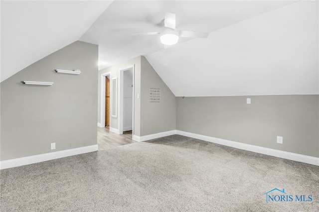 3122 Winston Blvd, Toledo, OH 43614 - additional living space with carpet, a ceiling fan, and vaulted ceiling