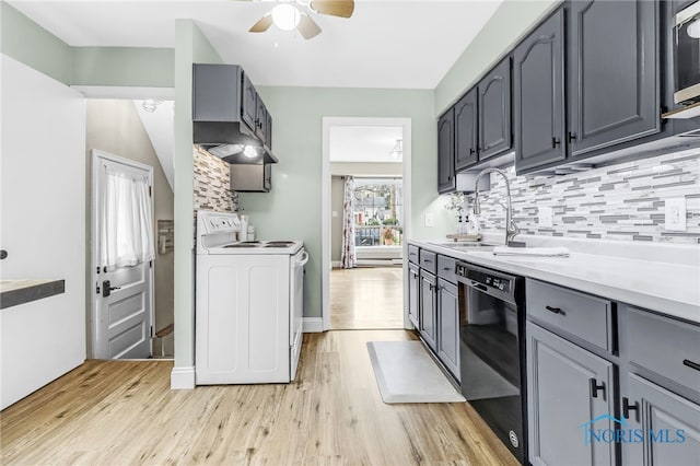 3122 Winston Blvd, Toledo, OH 43614 - kitchen featuring electric range, black dishwasher, a ceiling fan, and light wood finished floors