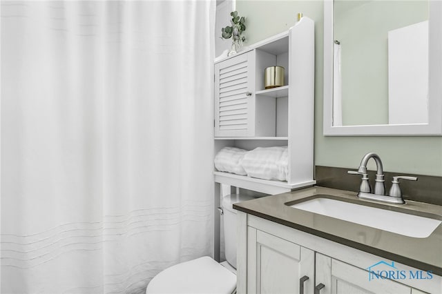 3122 Winston Blvd, Toledo, OH 43614 - bathroom featuring vanity and toilet