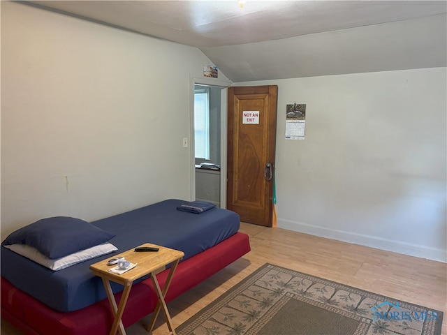 1336 Craigwood Rd, Toledo, OH 43612 - bedroom featuring vaulted ceiling and light wood-style floors