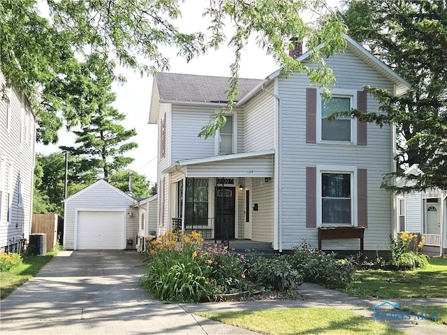 125 Baldwin Ave, Findlay, OH 45840 - view of front of property featuring an outbuilding, driveway, a garage, and a porch