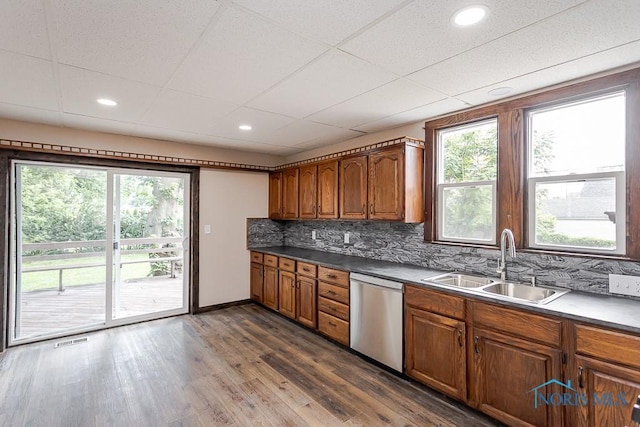 1553 Flormar Ct, Toledo, OH 43612 - kitchen featuring stainless steel dishwasher, tasteful backsplash, healthy amount of natural light, and recessed lighting