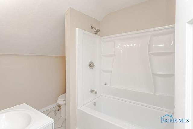 1553 Flormar Ct, Toledo, OH 43612 - bathroom featuring marble look tile flooring, lofted ceiling, bathing tub / shower combination, and vanity