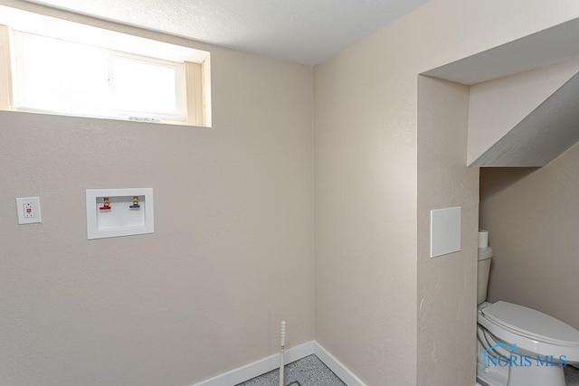 1553 Flormar Ct, Toledo, OH 43612 - washroom with washer hookup and baseboards