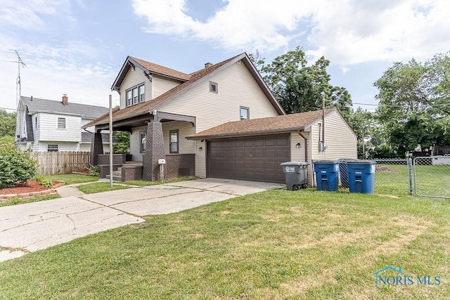 1553 Flormar Ct, Toledo, OH 43612 - view of front facade featuring driveway, an attached garage, and roof with shingles