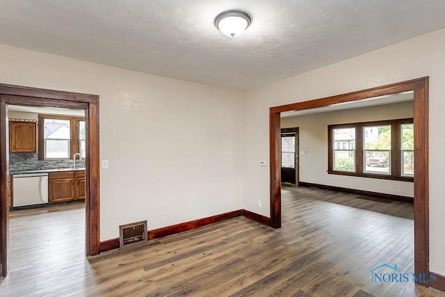1553 Flormar Ct, Toledo, OH 43612 - empty room with wood finished floors and plenty of natural light