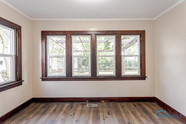 1553 Flormar Ct, Toledo, OH 43612 - empty room with dark wood-type flooring and ornamental molding