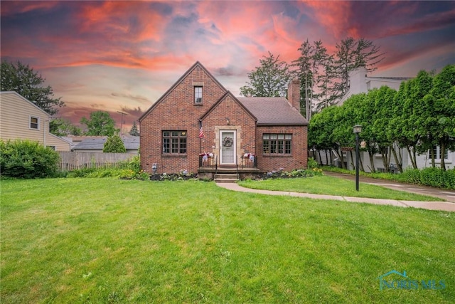 3740 Mapleway Dr, Toledo, OH 43614 - view of front of property with brick siding and a chimney