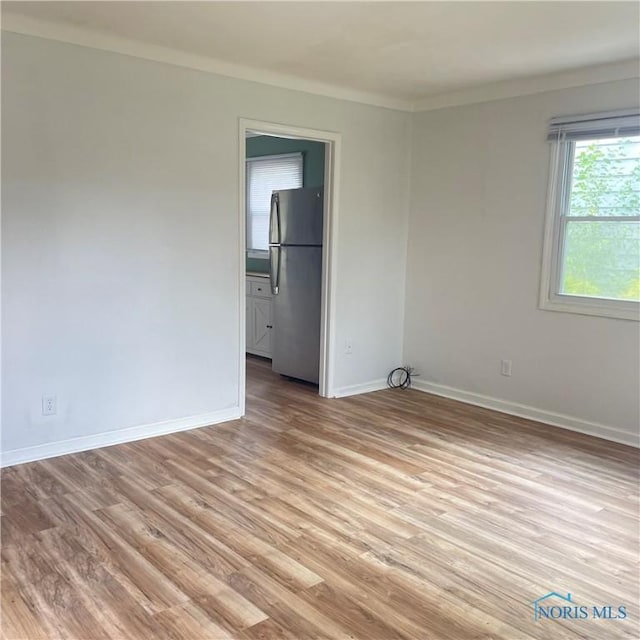 415 W Northgate Pkwy, Toledo, OH 43612 - unfurnished room with light wood finished floors and crown molding