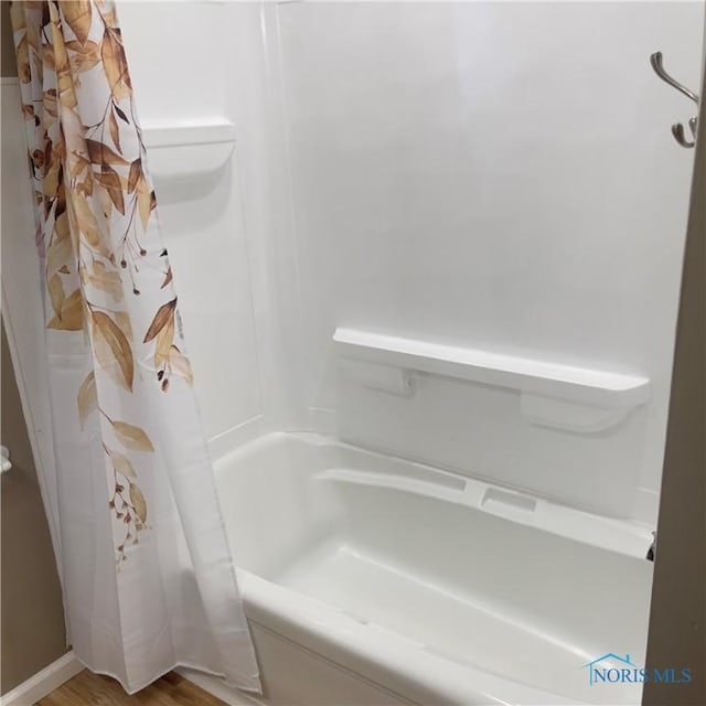 415 W Northgate Pkwy, Toledo, OH 43612 - bathroom with shower / bath combination with curtain and wood finished floors