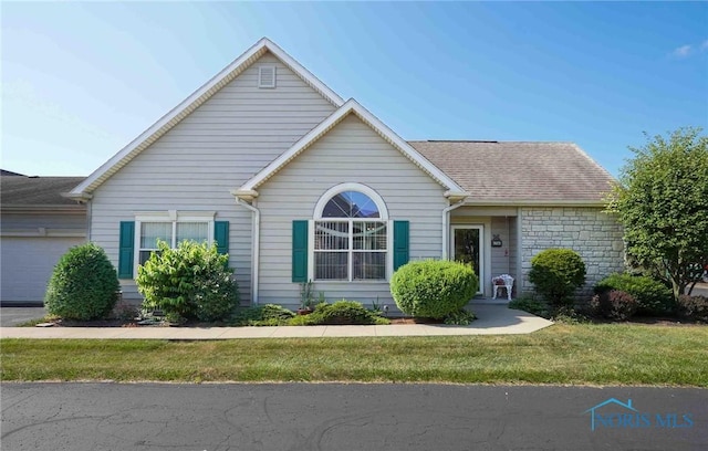 7673 Brookstone Dr Unit U7673, Findlay, OH 45840 - single story home with an attached garage