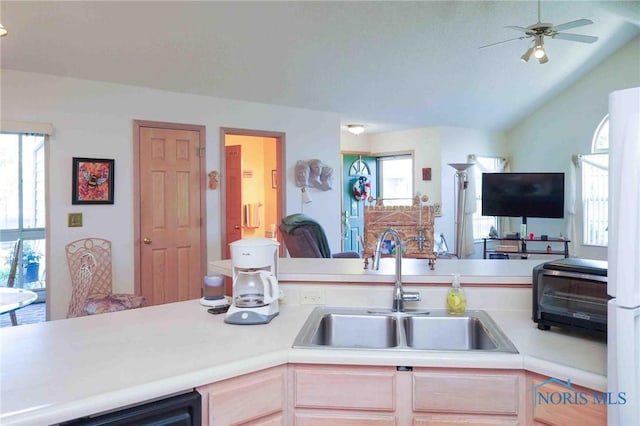 7673 Brookstone Dr Unit U7673, Findlay, OH 45840 - kitchen with light countertops, open floor plan, plenty of natural light, ceiling fan, and lofted ceiling