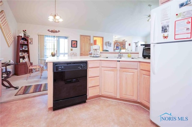 7673 Brookstone Dr Unit U7673, Findlay, OH 45840 - kitchen with freestanding refrigerator, black dishwasher, light brown cabinetry, and light carpet