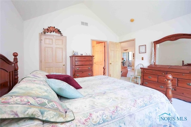 7673 Brookstone Dr Unit U7673, Findlay, OH 45840 - bedroom with vaulted ceiling and carpet flooring