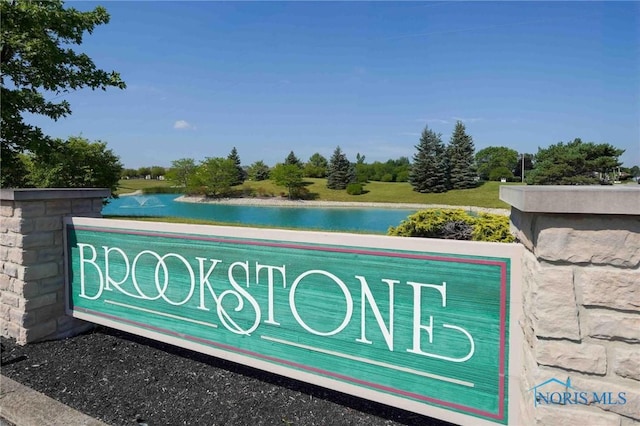 7673 Brookstone Dr Unit U7673, Findlay, OH 45840 - community / neighborhood sign featuring a water view