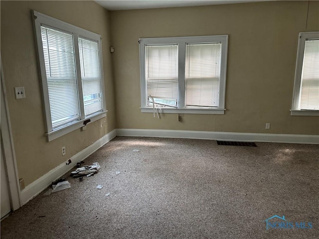 1623 W Central Ave, Toledo, OH 43606 - carpeted empty room with baseboards