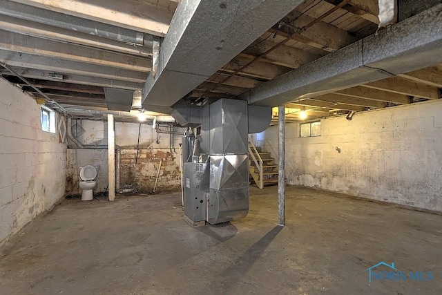 452 E Park St, Toledo, OH 43608 - basement with heating unit and stairs