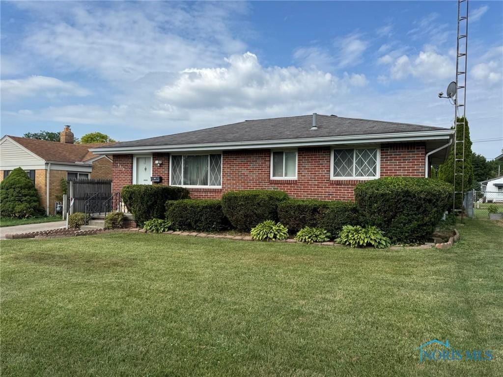 4317 290th St, Toledo, OH 43611 - ranch-style house with brick siding and roof with shingles