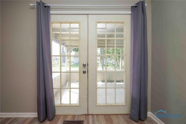 601 Edith Ave, Findlay, OH 45840 - doorway featuring wood finished floors and french doors