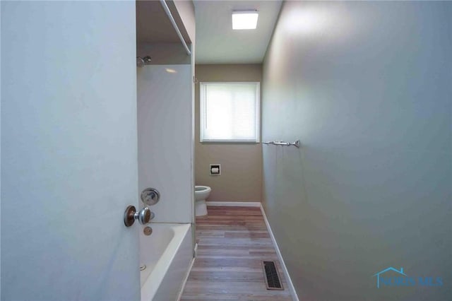 601 Edith Ave, Findlay, OH 45840 - bathroom with shower / bathtub combination and wood finished floors