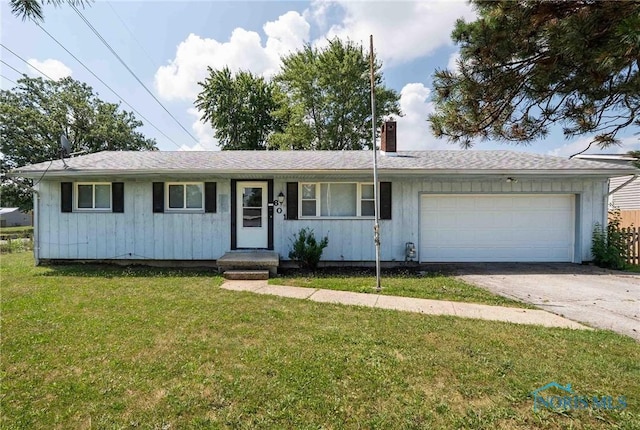 601 Edith Ave, Findlay, OH 45840 - single story home featuring driveway, a garage, a chimney, and a front lawn